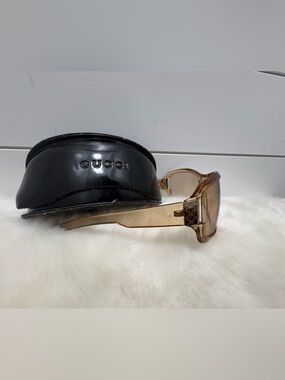 Gucci Women’s Light Brown Transparent Frame Sunglasses